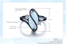 Opal & Black Gold Ring